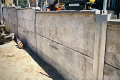 Soldier pile and precast concrete panel retaining wall. Toronto, Ontario.