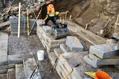 SienaStone 500 retaining wall under construction on a hill. Toronto, Ontario.