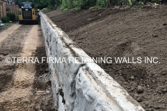 180’ long and 4’ high precast concrete block retaining wall. Burlington, Ontario.
